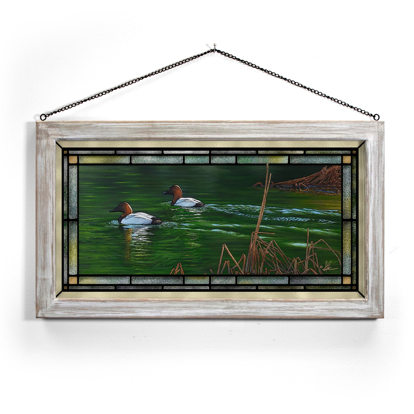 Framed painting with swimming ducks in the river