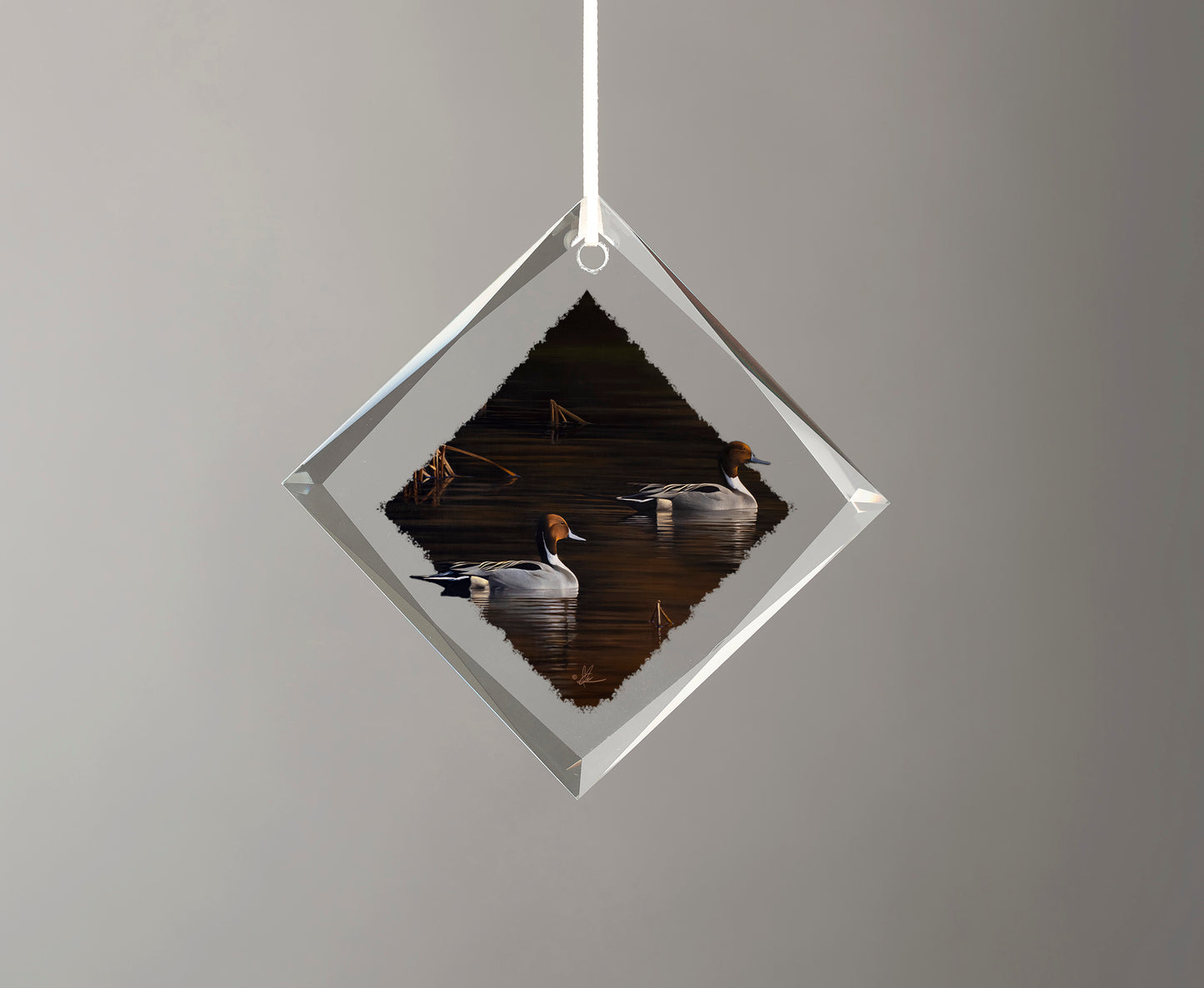 Glass ornament with ducks in the river