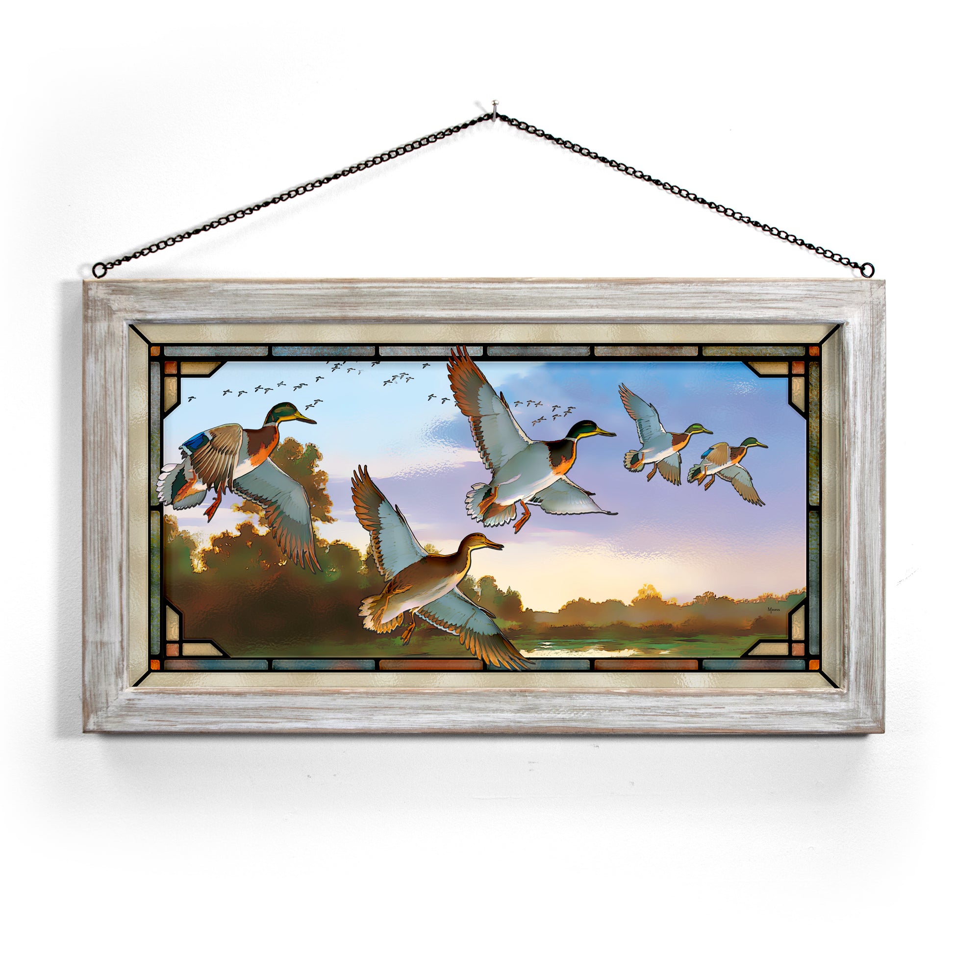 Framed painting with flying mallards