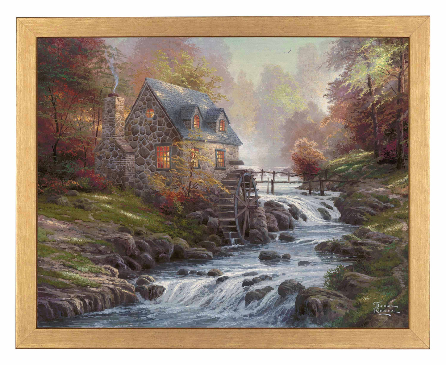 Framed painting of cobblestone house and trees by the river
