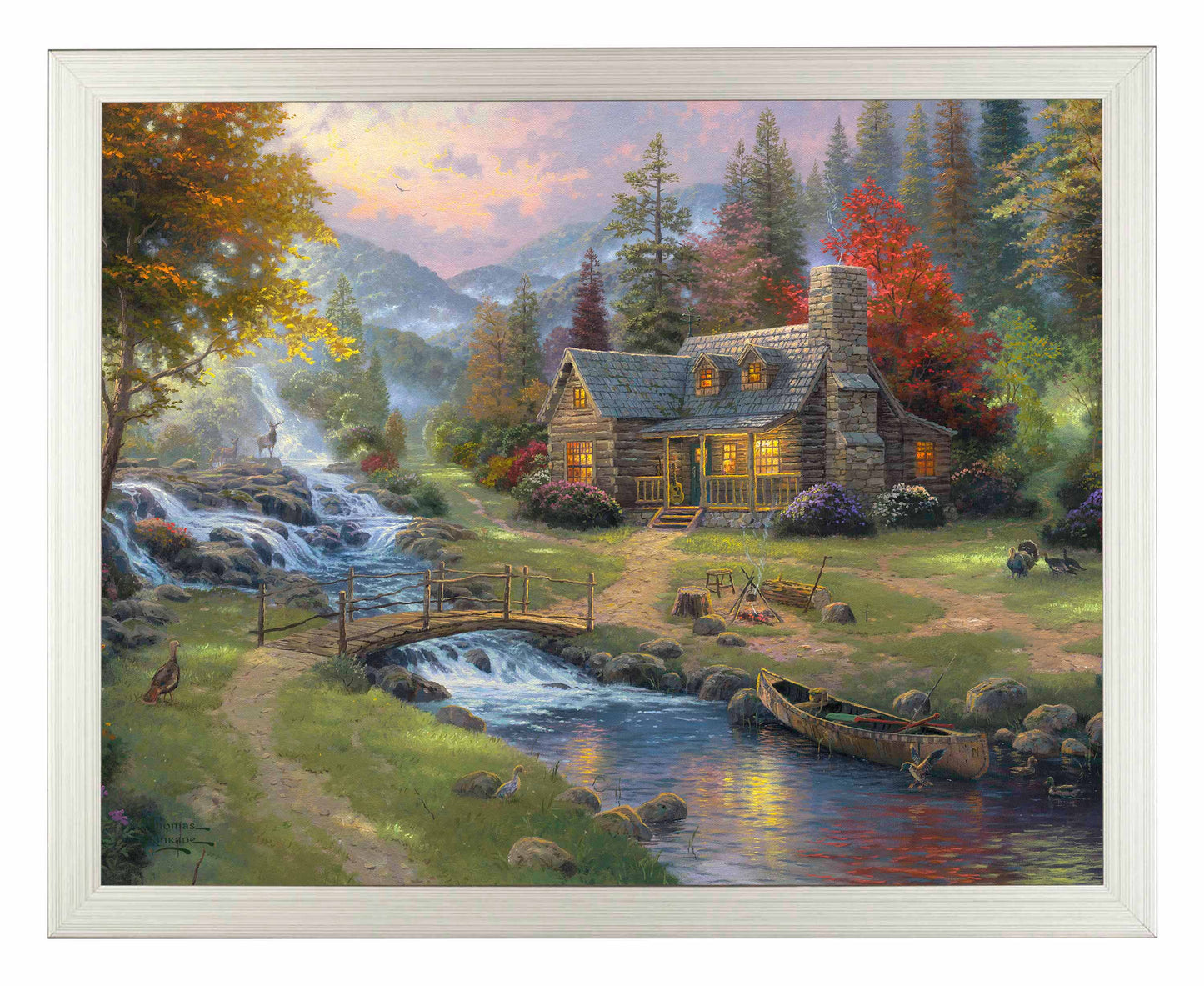 Framed painting of a house with trees and mountain by the river