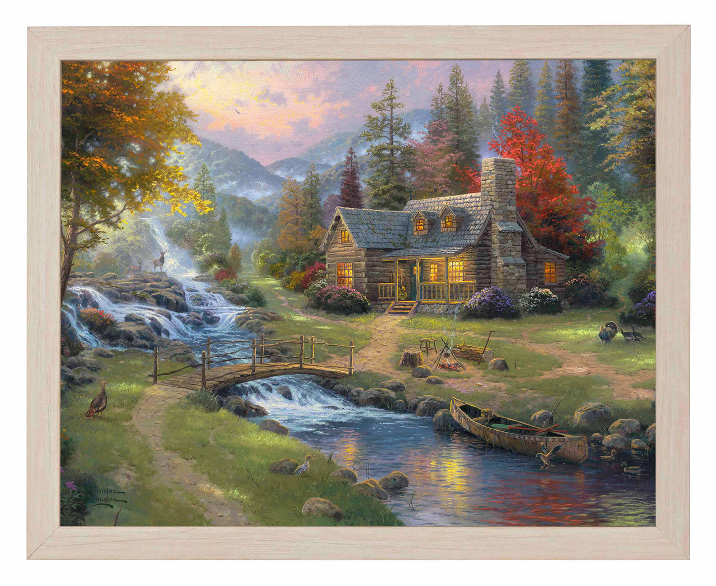 Framed painting of a house with trees and mountain by the river