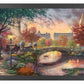 Framed painting of autumn in New York showing a bridge and trees by the river