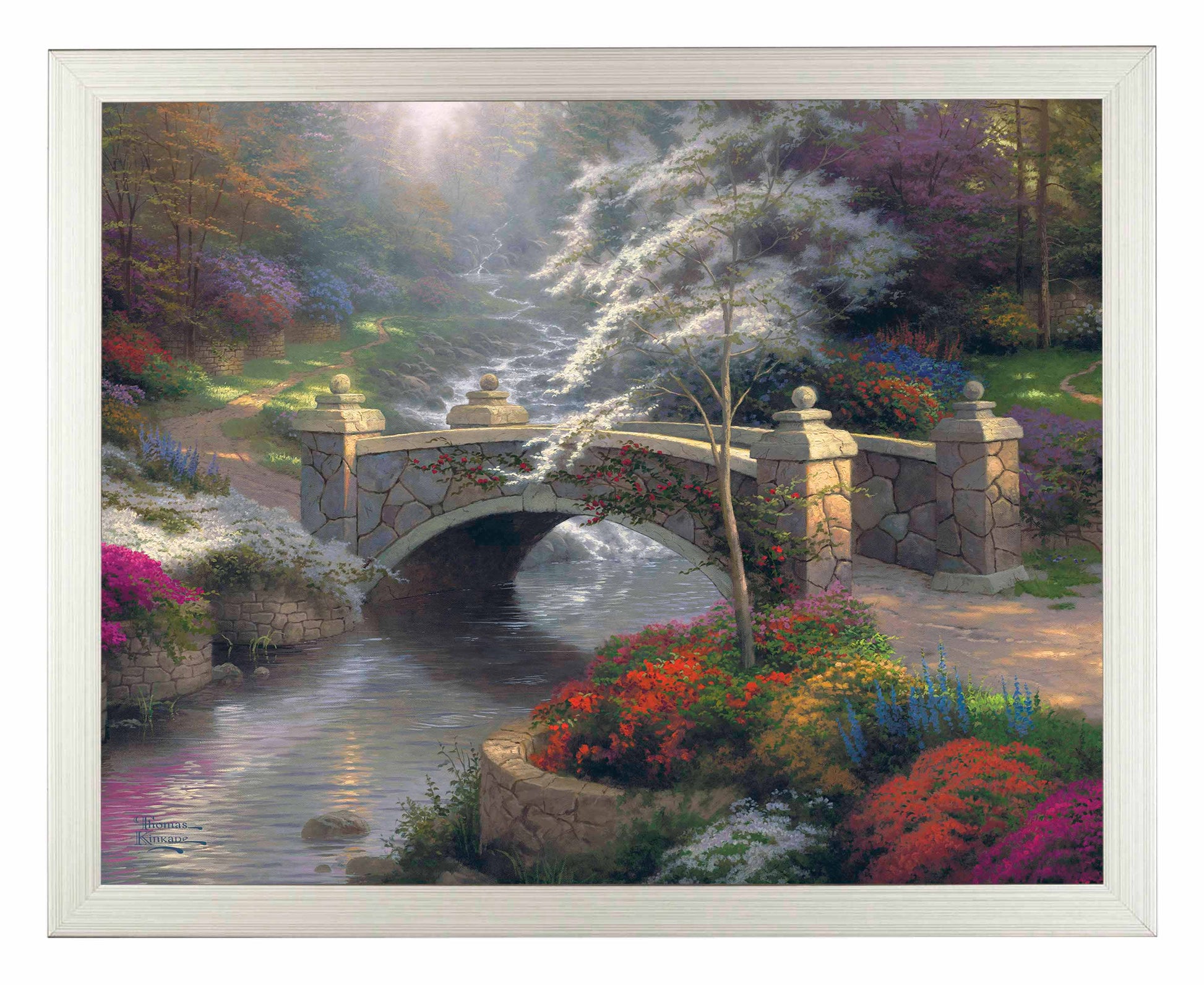 Framed painting of a bridge with roses by the river