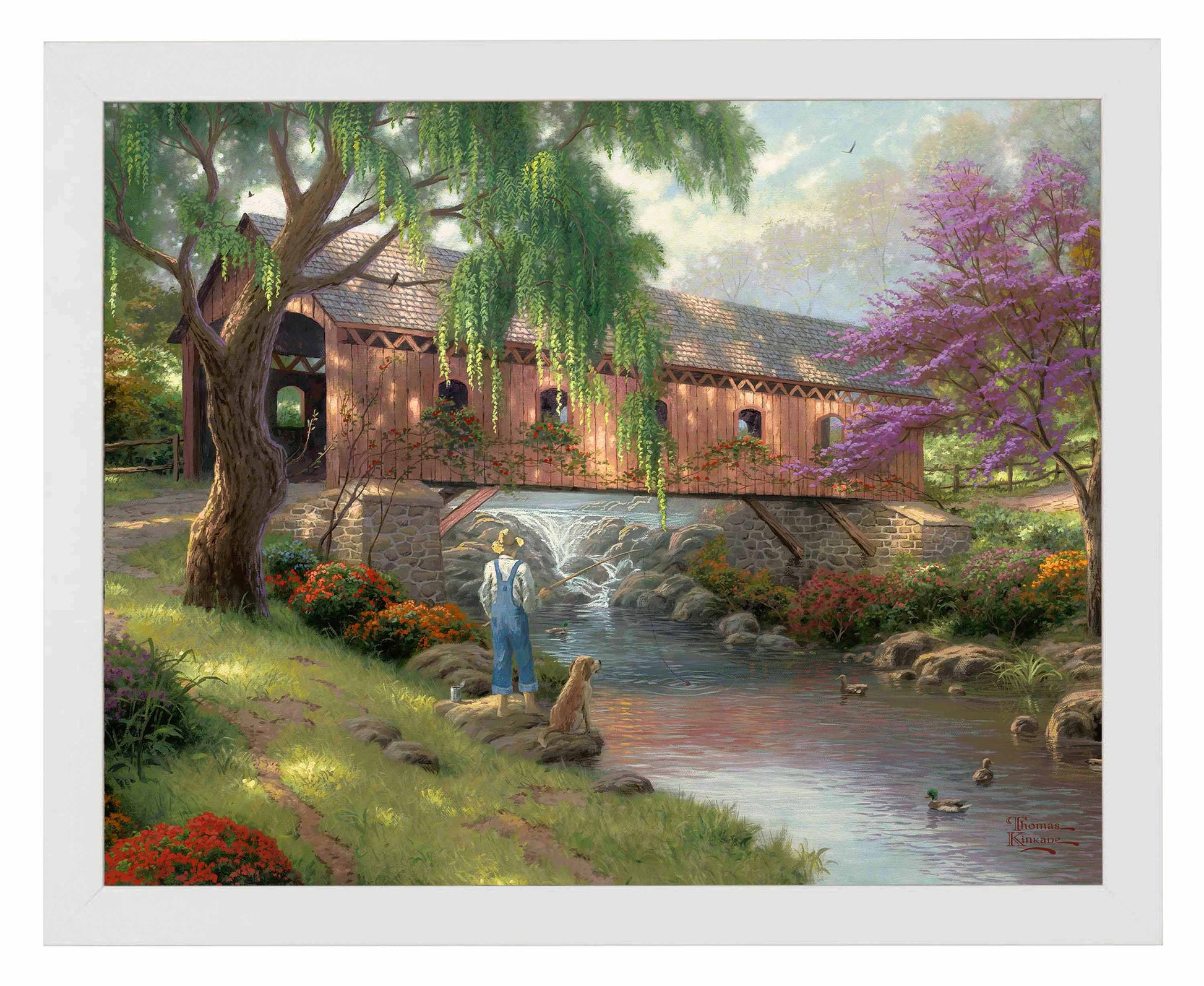 Framed painting of a house and trees by the river