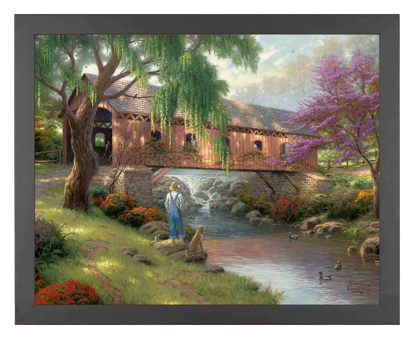 Framed painting of a house and trees by the river