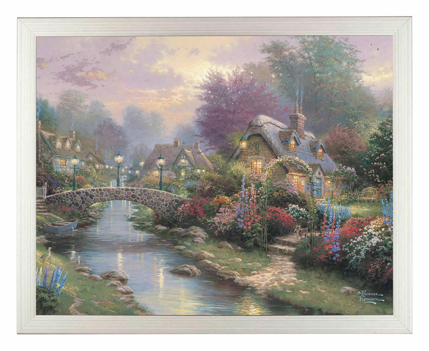 Framed painting of a lamplight bridge and house with roses by the river