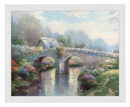 Framed painting of a bridge with blossoming trees and flowers