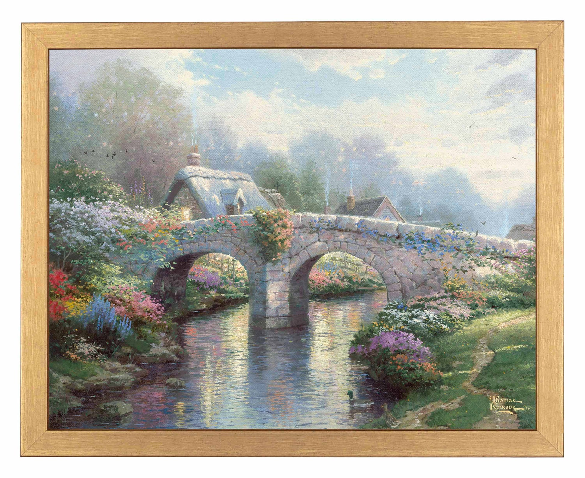 Framed painting of a bridge with blossoming trees and flowers