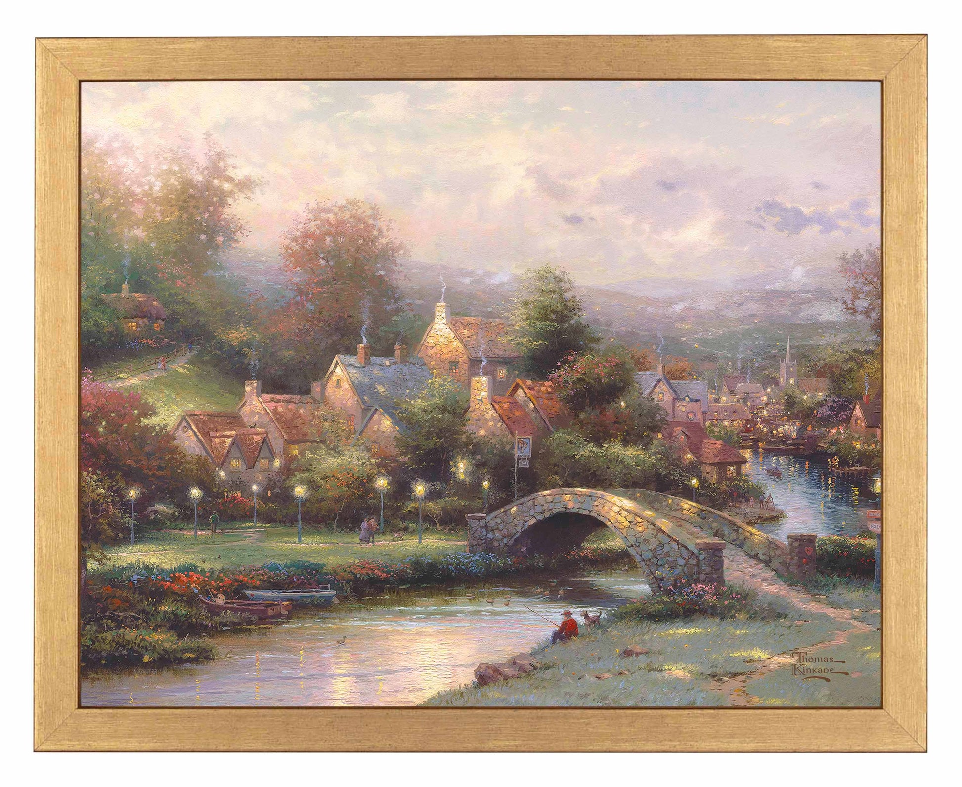 Framed painting of a village with houses, trees and a bridge by the river
