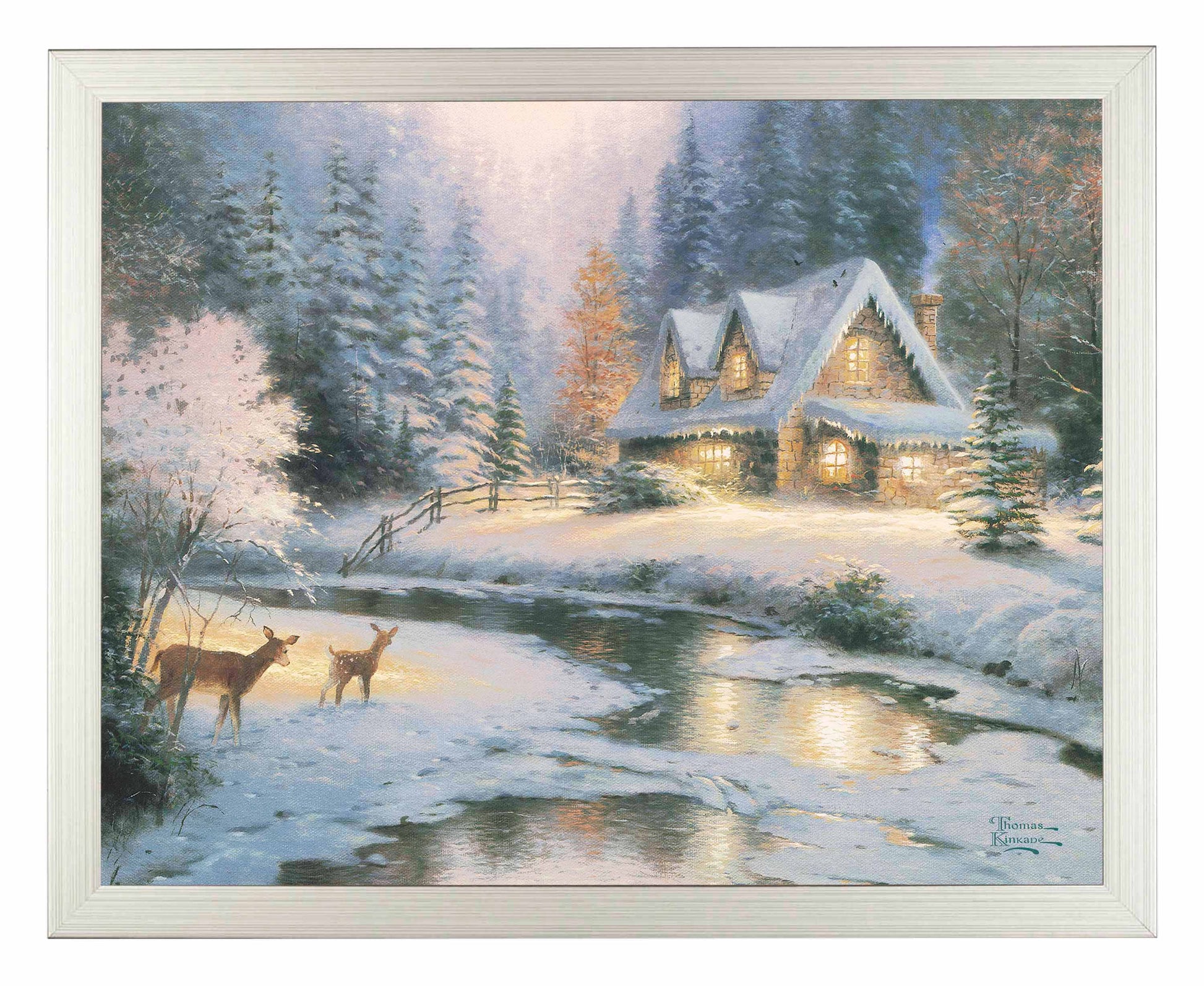 Framed painting of snowy cottage by the lake with deer around