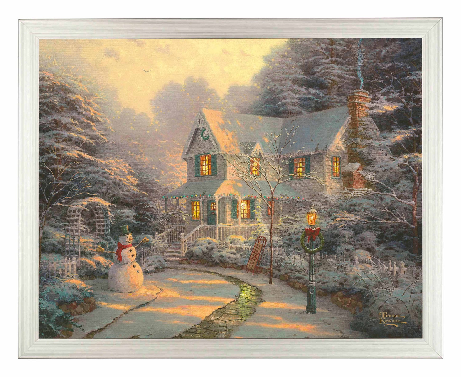 Framed painting of Christmas house with snowy trees