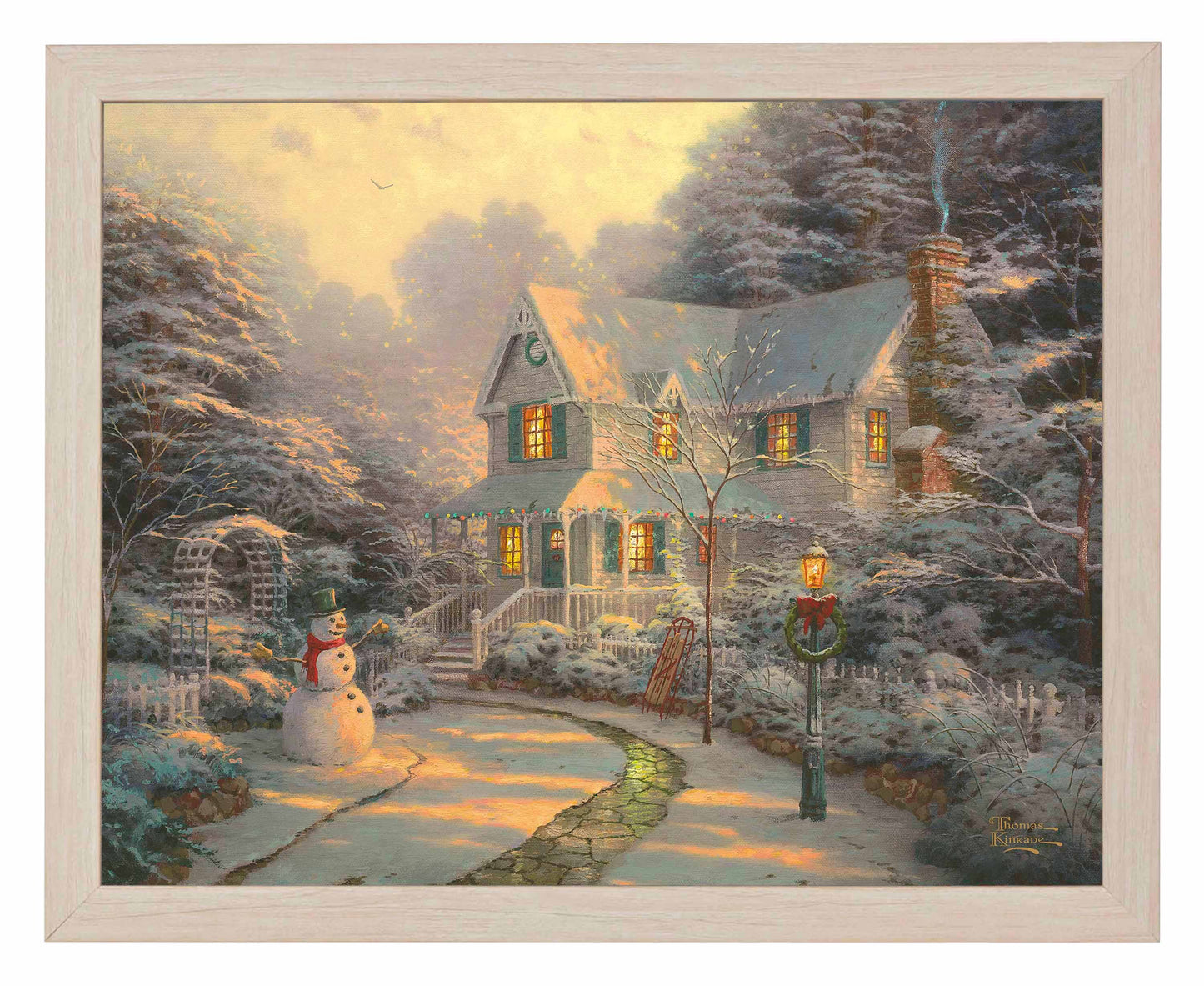 Framed painting of Christmas house with snowy trees