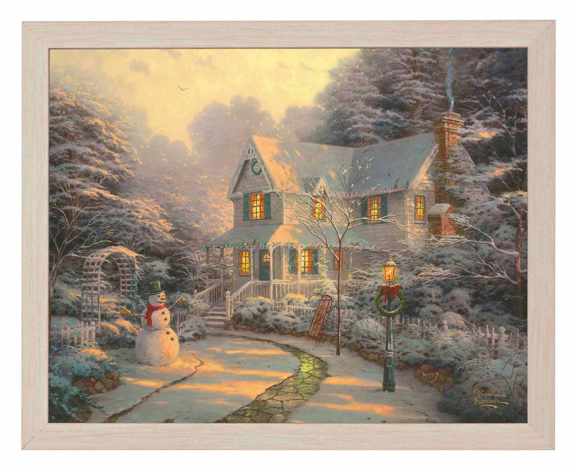 Framed painting of Christmas house with snowy trees