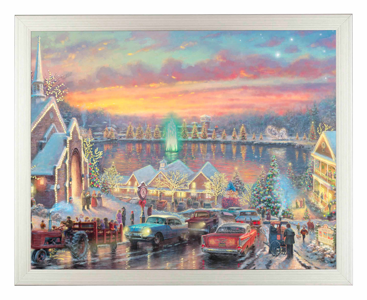 Framed painting of Christmas with vibrant lights of the city with a chapel, houses, people and cars all by the river