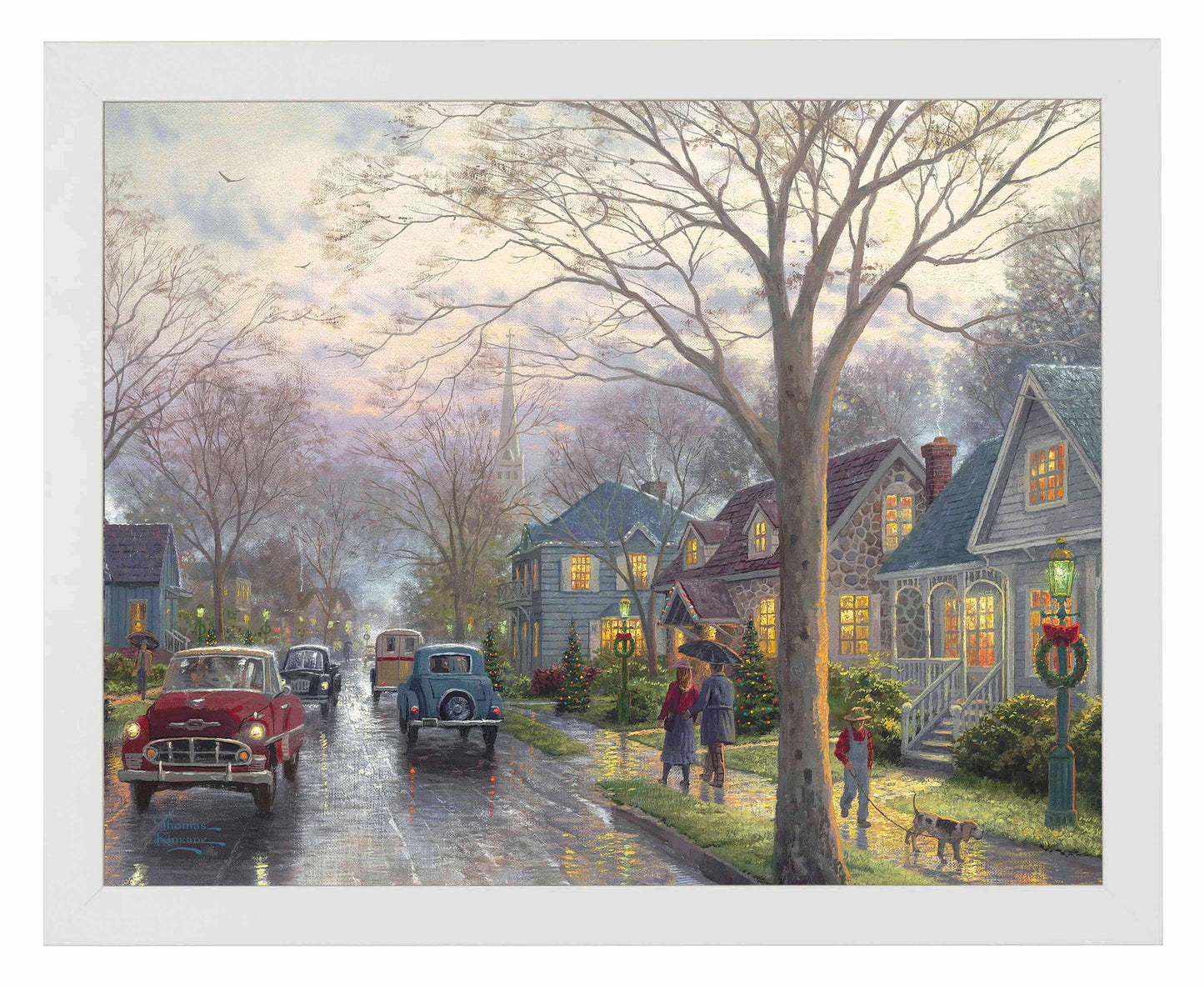 Framed painting of hometown Christmas with houses and cars on the street