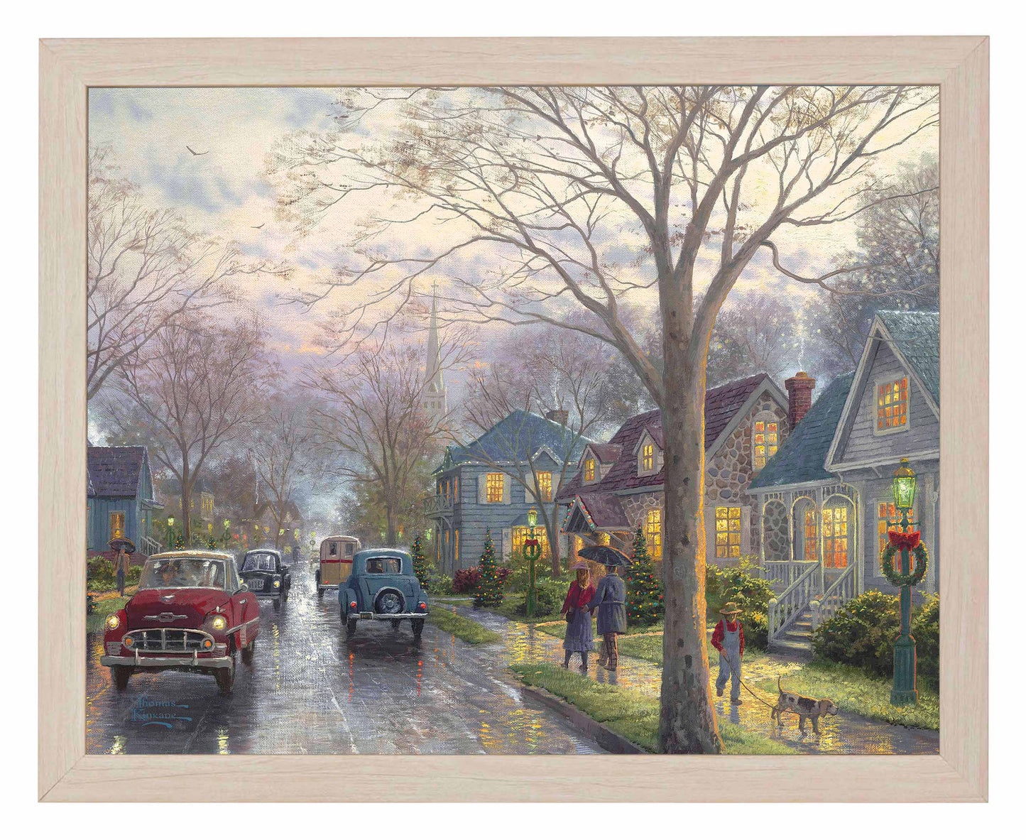 Framed painting of hometown Christmas with houses and cars on the street