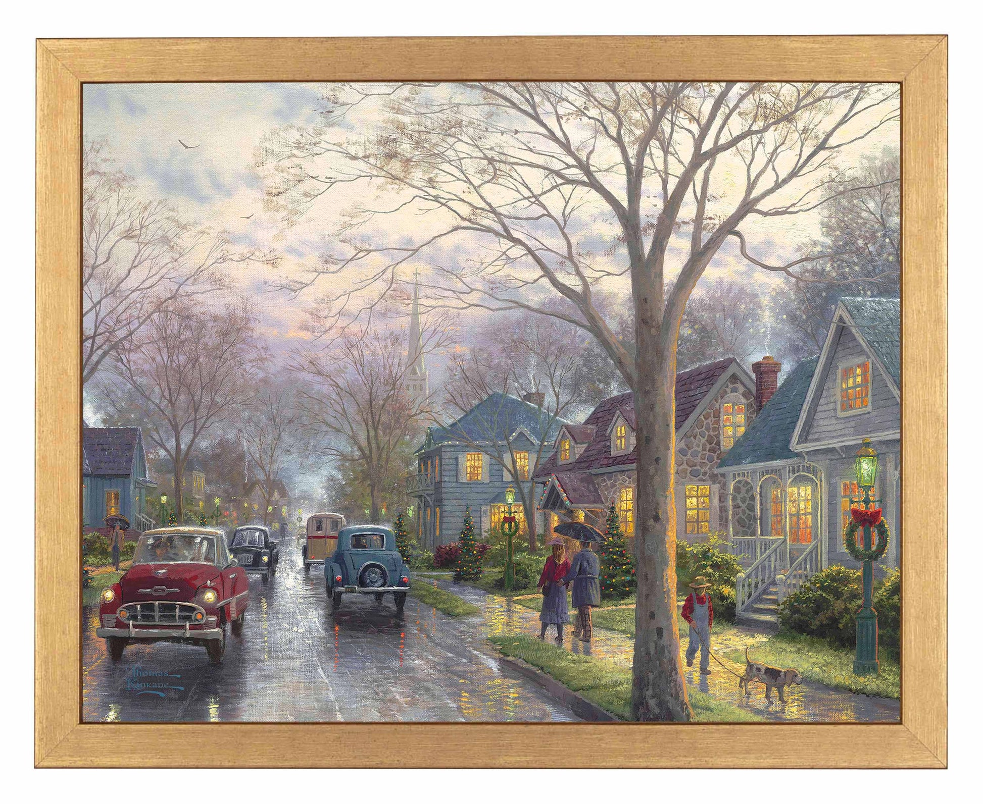 Framed painting of hometown Christmas with houses and cars on the street