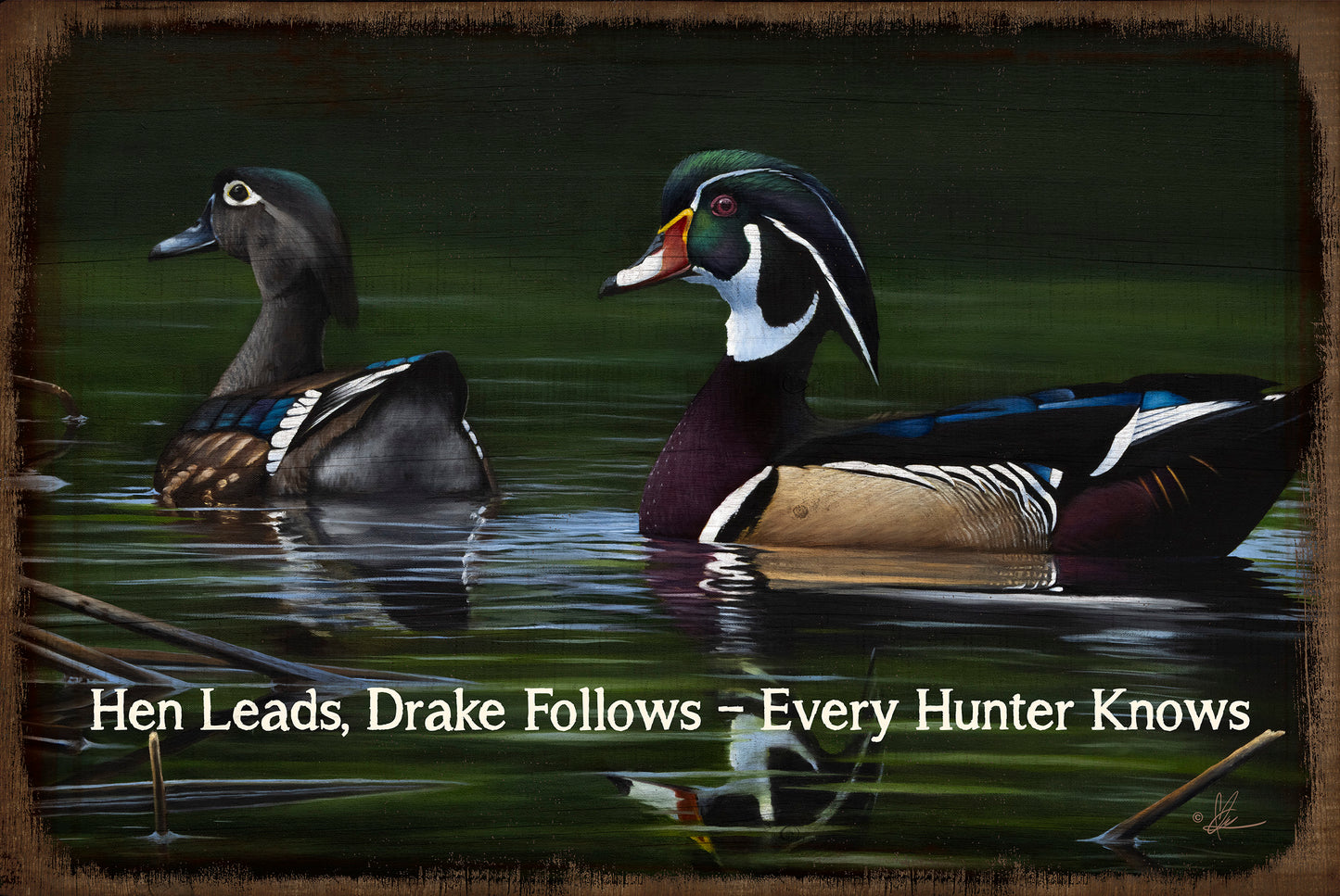 Wood sign with two swimming ducks saying "Hen leads, drake follows - every hunter knows"