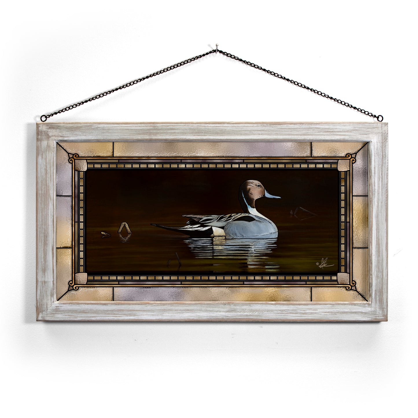 Framed painting of a duck in the water