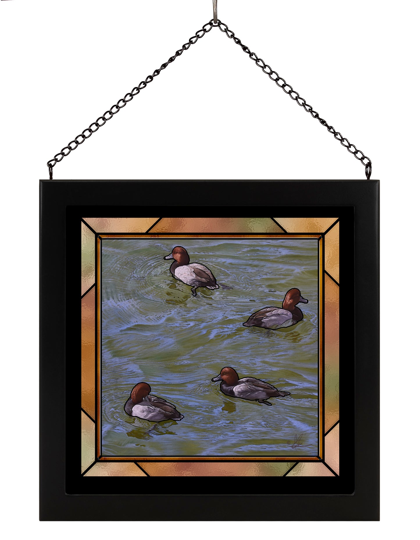 Framed image of little swimming ducks