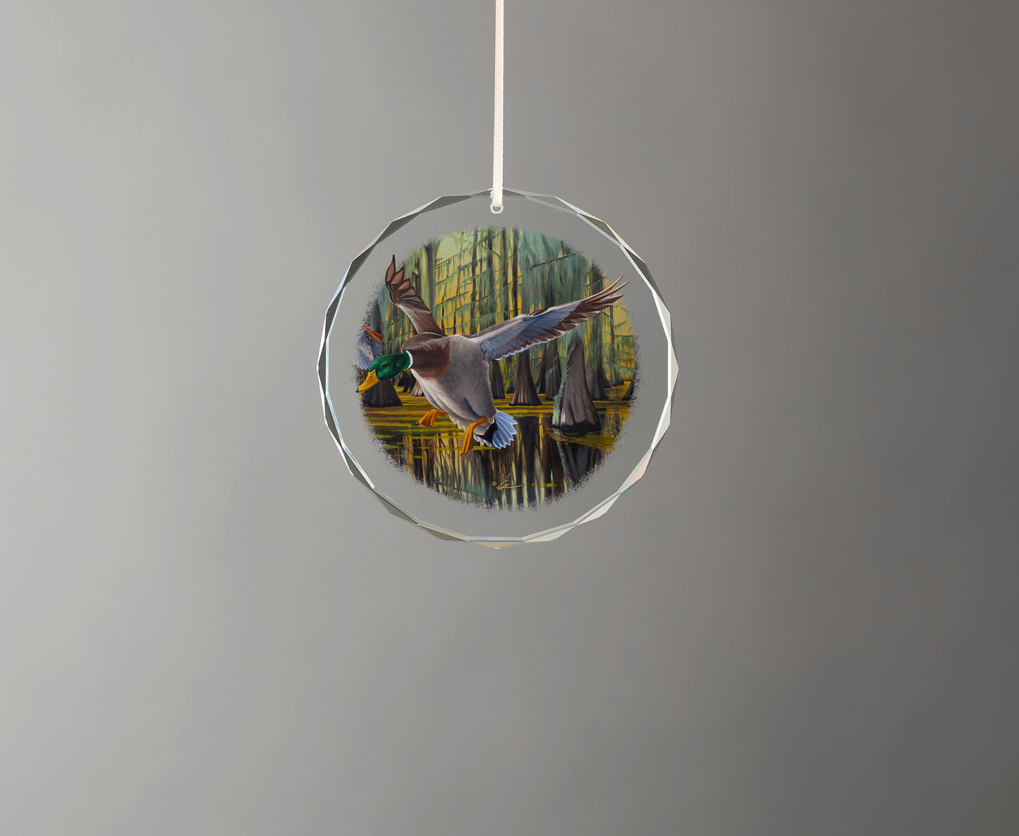 Glass ornament with birds