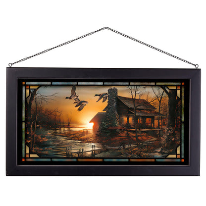 Framed painting of sunset with a house by the river